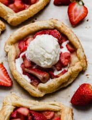 Vanilla ice cream topped Rhubarb Strawberry Galette.