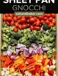 Colorful vegetables and potato gnocchi on a sheet pan with the words, "Sheet pan gnocchi" written in white text above the photo.